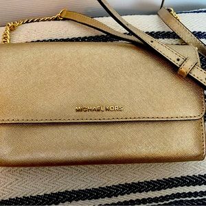 Micheal Kors gold crossbody bag